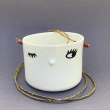 Load image into Gallery viewer, Nosy hanging flower pot, medium size, one open eye.