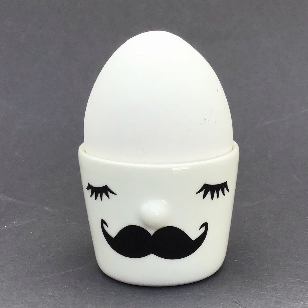 Nosy egg cup, closed eyes, mustache