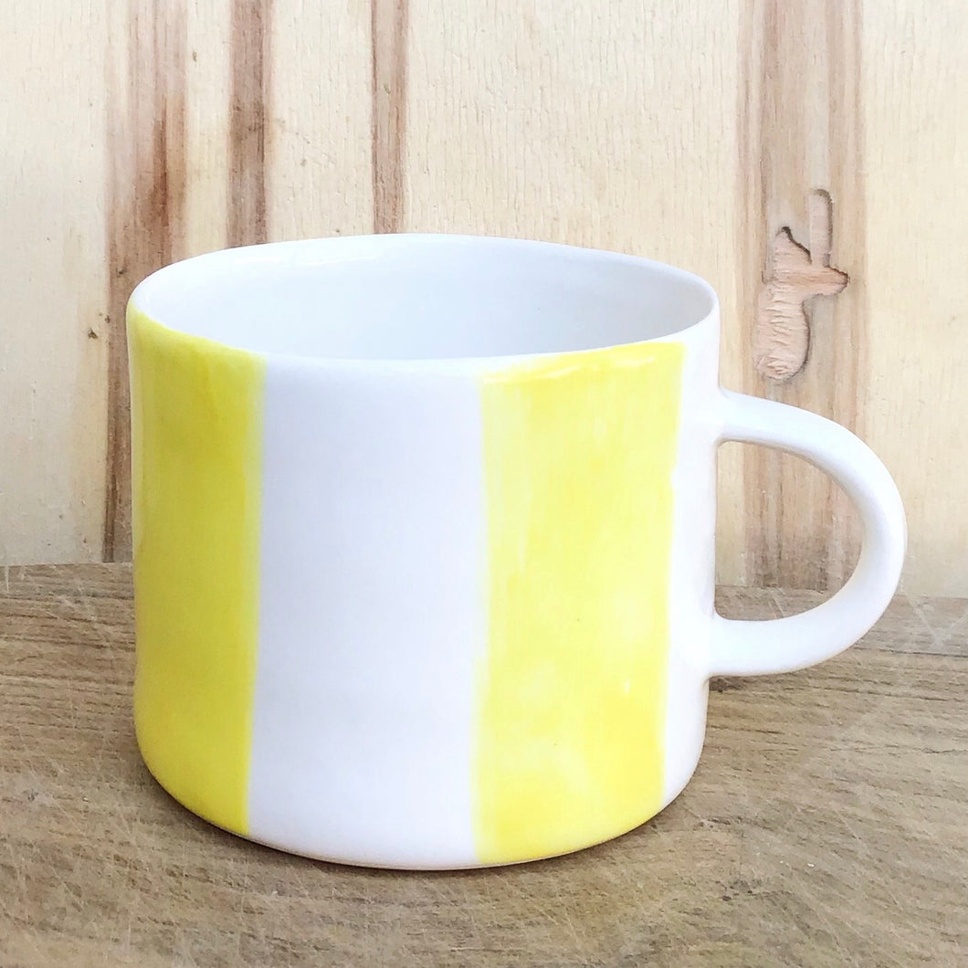 Alberta, light yellow striped cup with a handle, medium size
