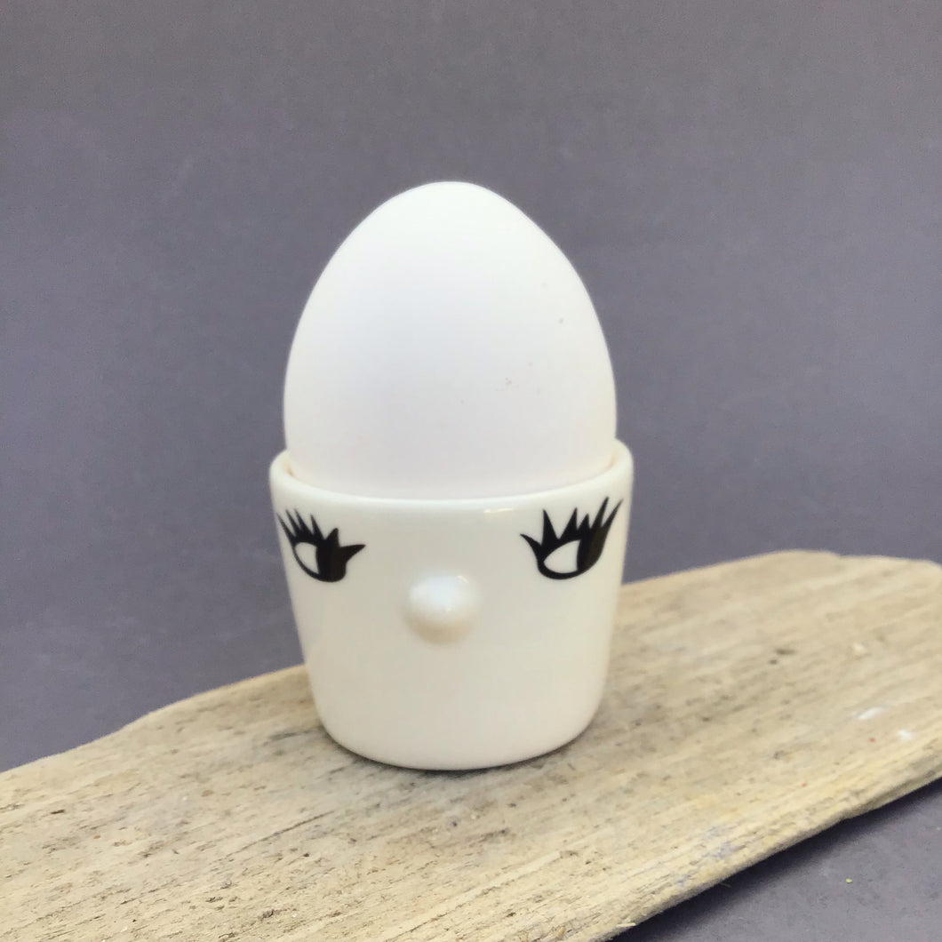 Nosy egg cup, open eyes,